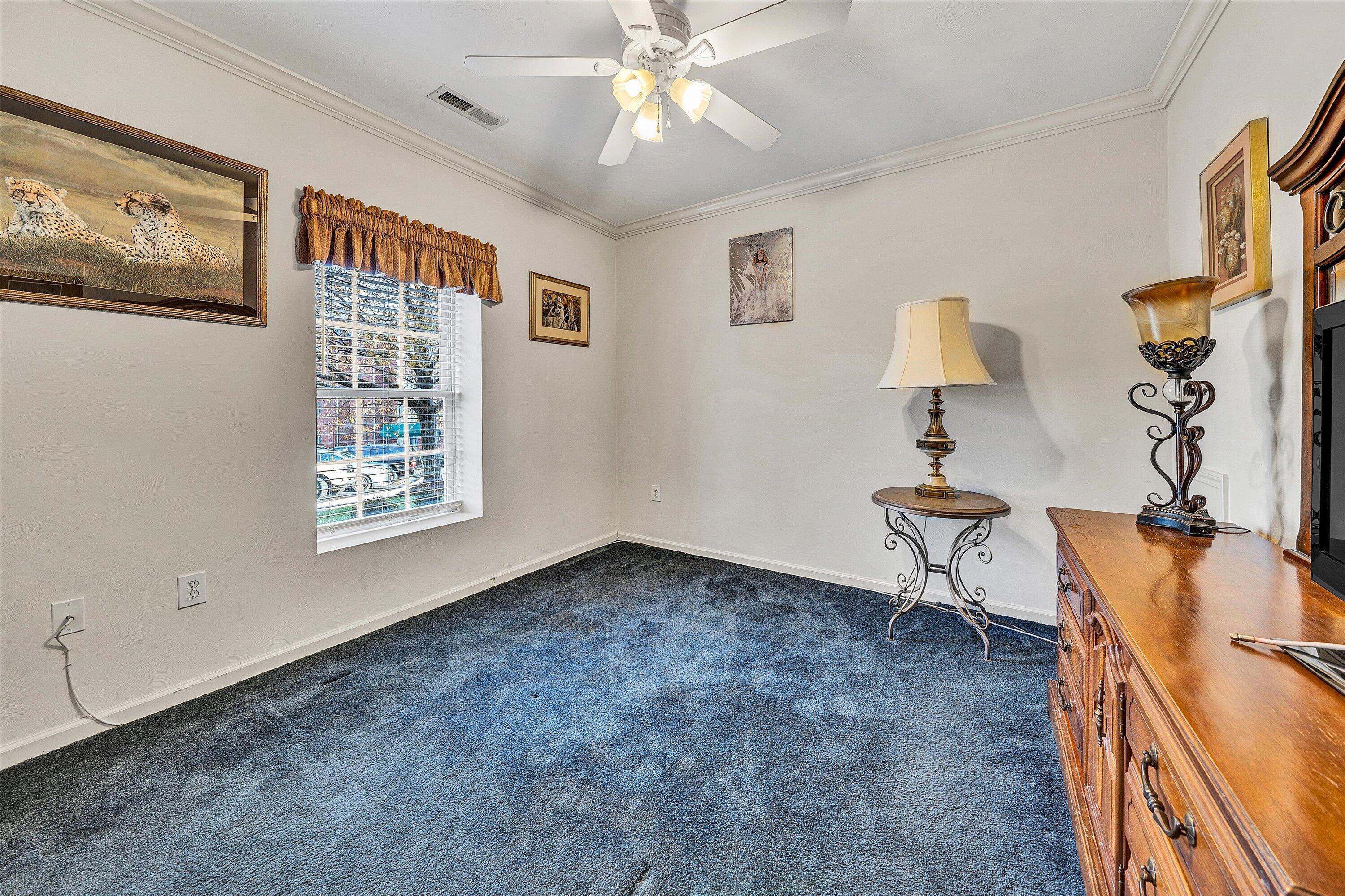 4434 Pheasant Ridge Road, Unit 101 Roanoke, VA 24014 - Photo 21 of 31 a living room with furniture and a window