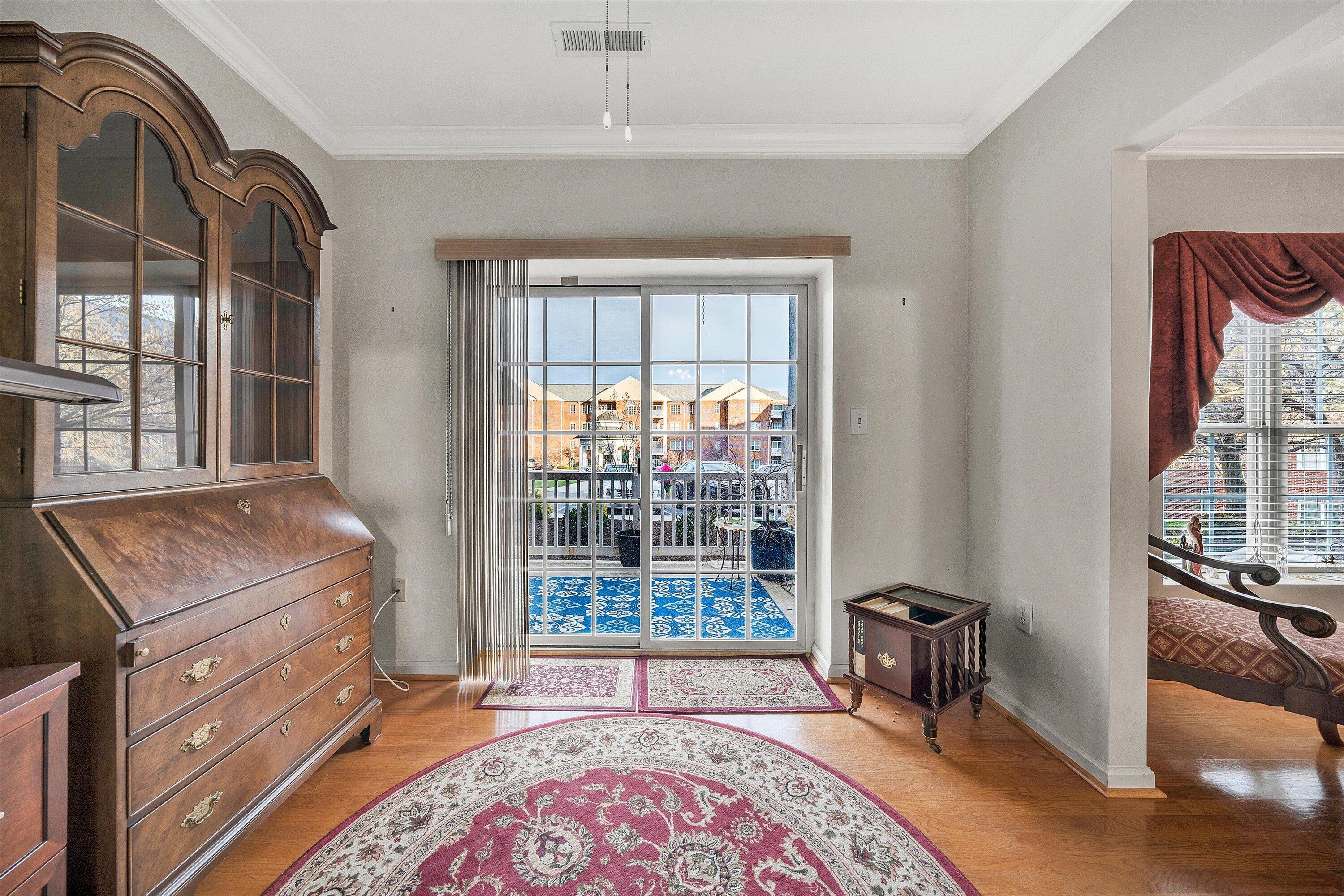 4434 Pheasant Ridge Road, Unit 101 Roanoke, VA 24014 - Photo 24 of 31 a room with a bed and a chair