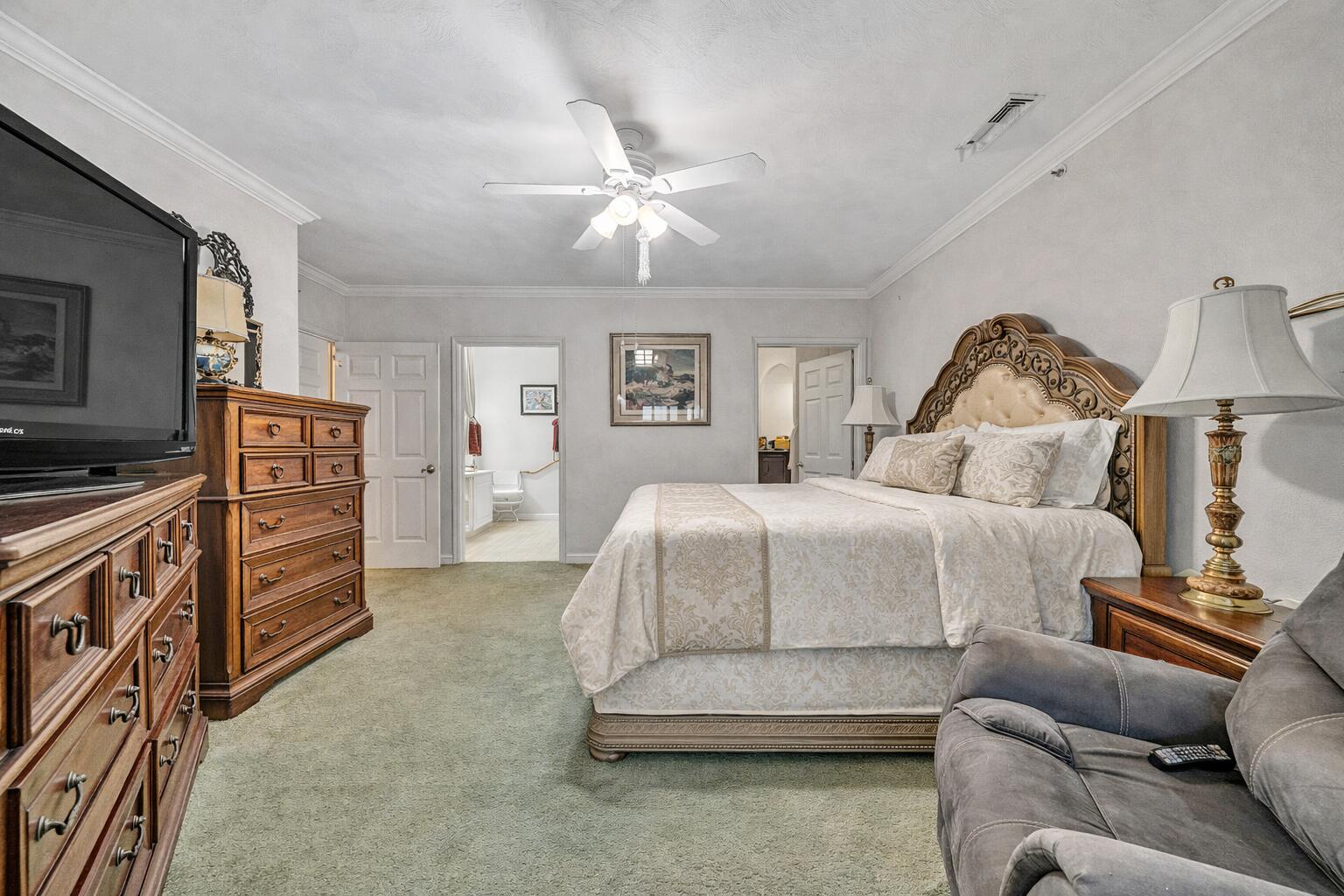 4434 Pheasant Ridge Road, Unit 101 Roanoke, VA 24014 - Photo 26 of 31 a bedroom with a bed and a flat screen tv