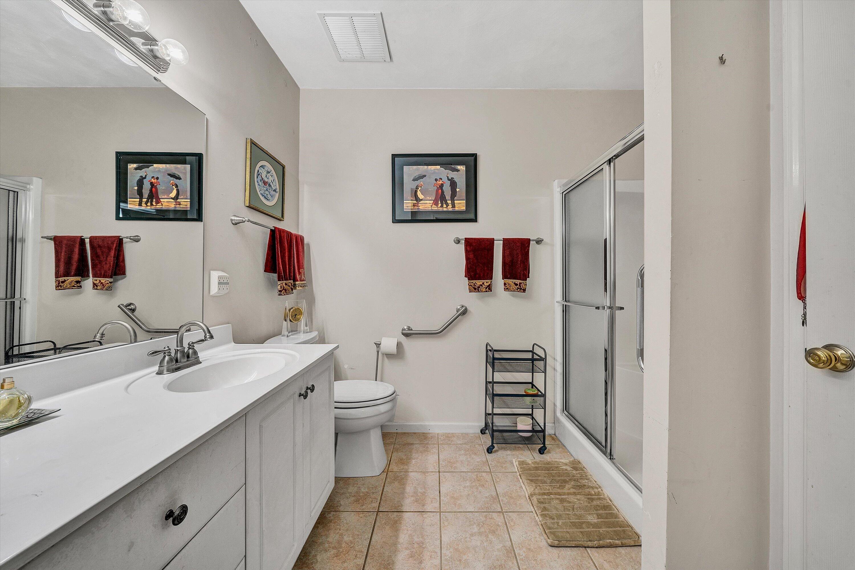 4434 Pheasant Ridge Road, Unit 101 Roanoke, VA 24014 - Photo 28 of 31 a bathroom with a sink and a mirror