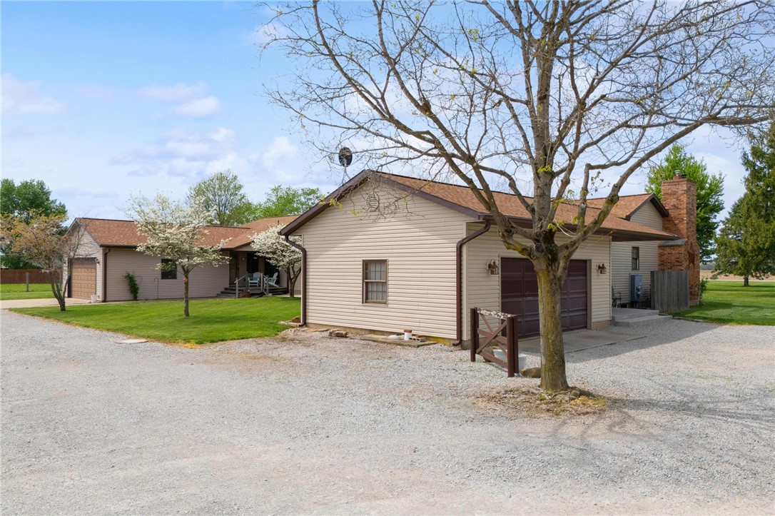 4971 Lackey Road Cedarville, OH 45314 - Photo 6 of 79 This welcoming residence offers ample outdoor space and a cozy, private atmosphere.
