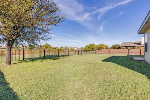 a view of a field with a yard