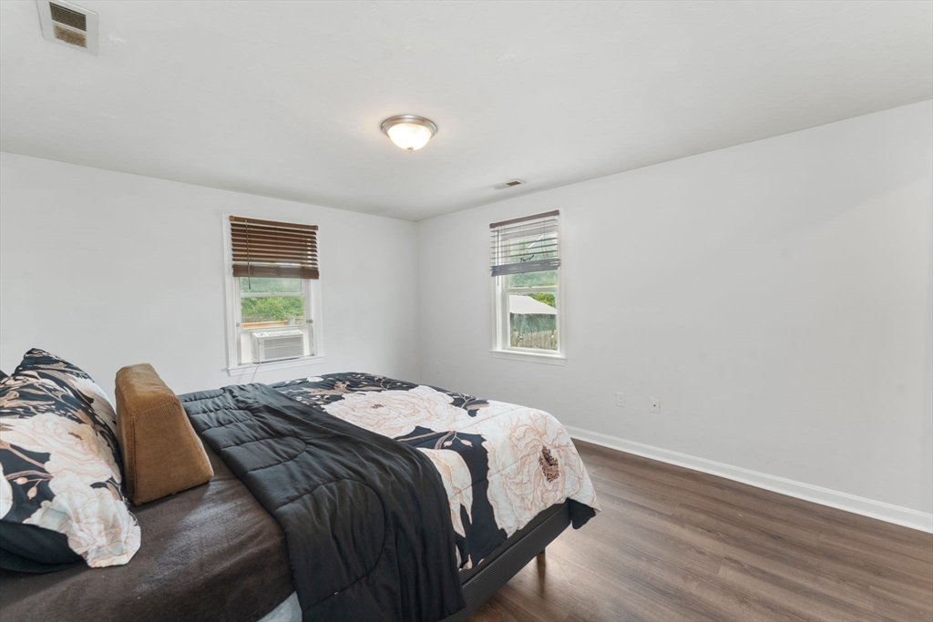 18 Edinboro Avenue Brockton, MA 02301 - Photo 20 of 28 a bedroom with a bed and a window