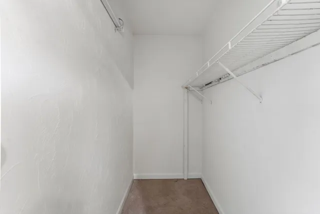 a view of a room with racks on the wall