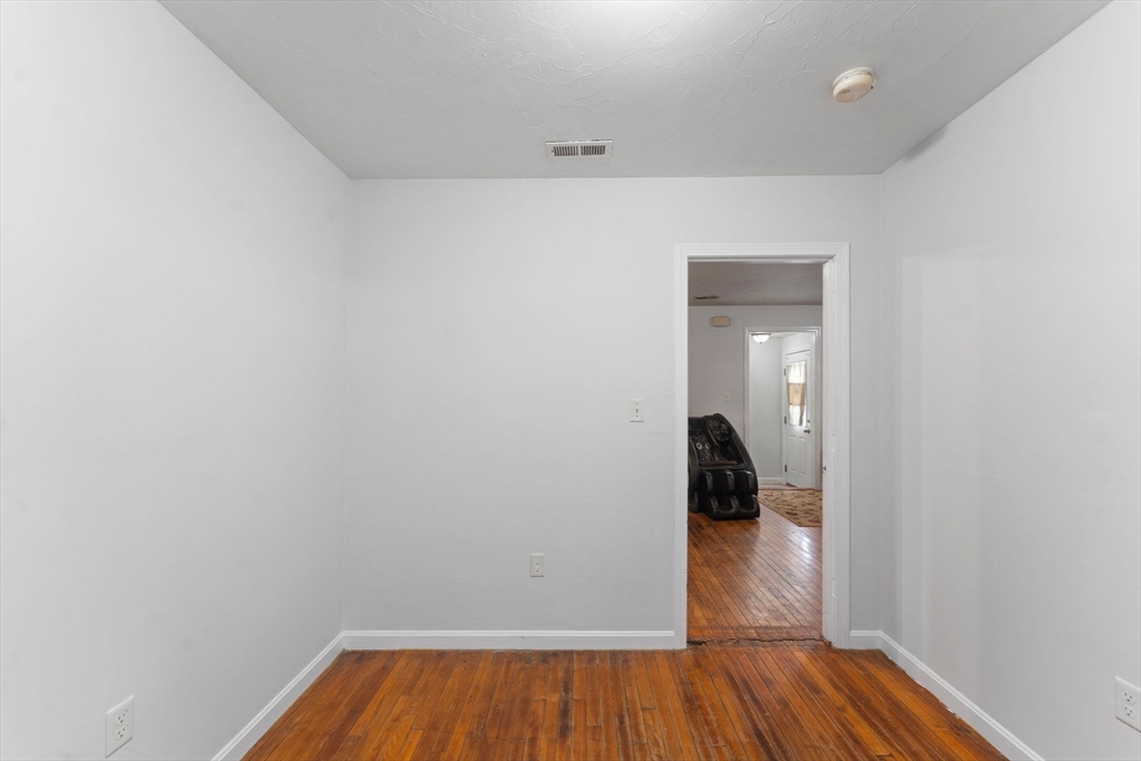 18 Edinboro Avenue Brockton, MA 02301 - Photo 26 of 28 a view of a room with wooden floor