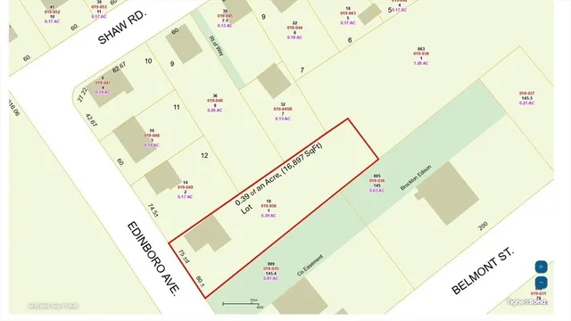 a view of a living room with a white bed