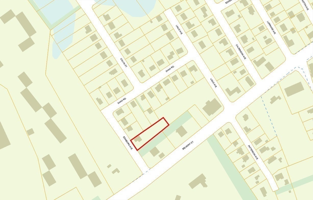 18 Edinboro Avenue Brockton, MA 02301 - Photo 4 of 28 a white bed sitting next to a yellow curtain