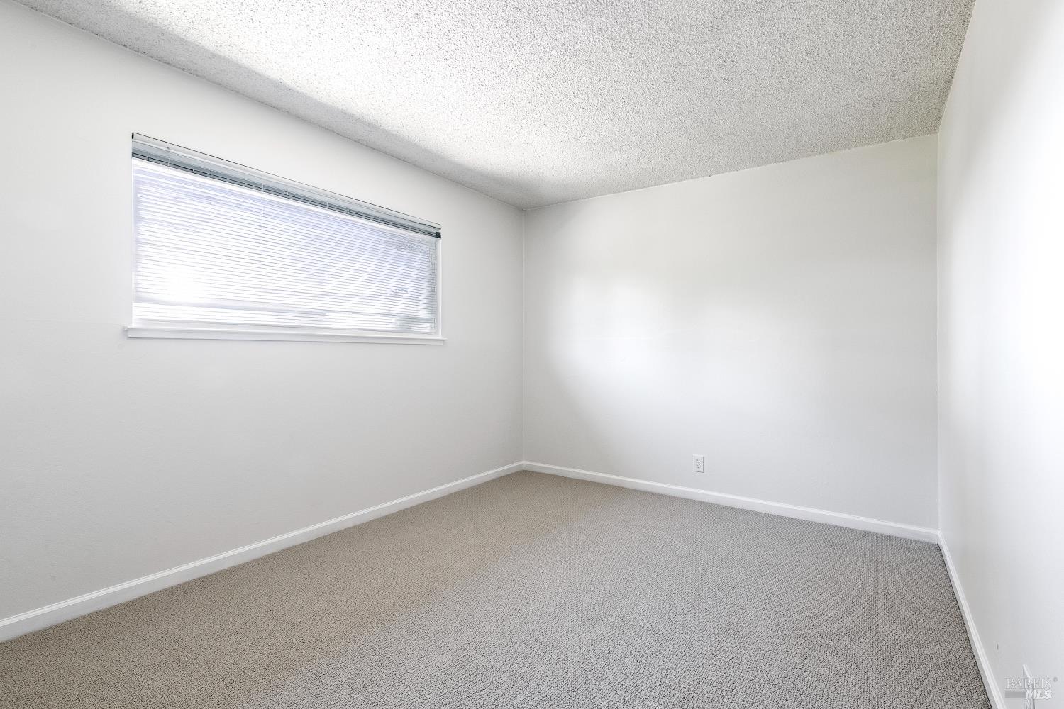 247 Bahia Place San Rafael, CA 94901 - Photo 17 of 22 an empty room with a window