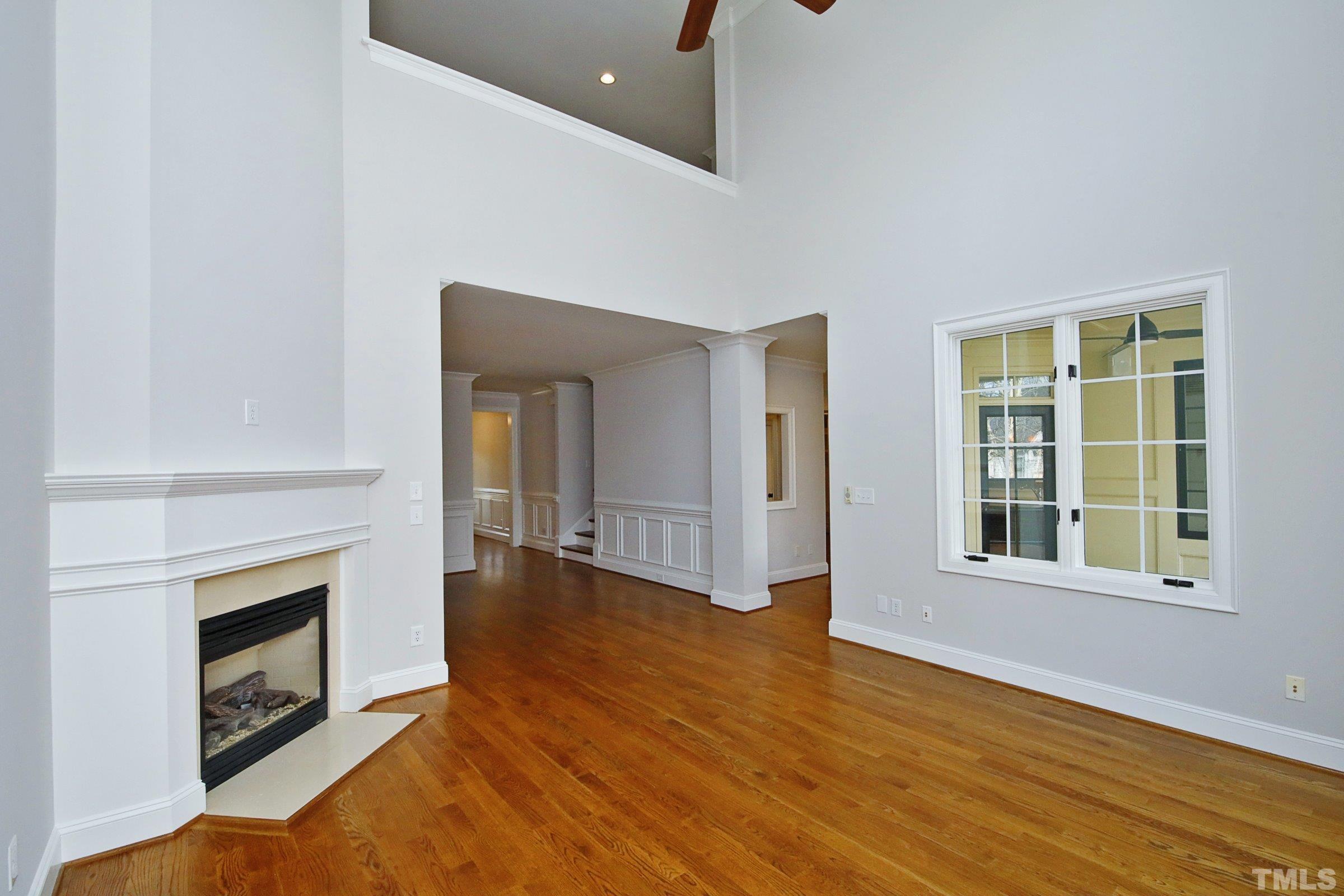 143 Cofield Circle Durham, NC 27707 - Photo 11 of 43 wooden floor fireplace and natural light in room