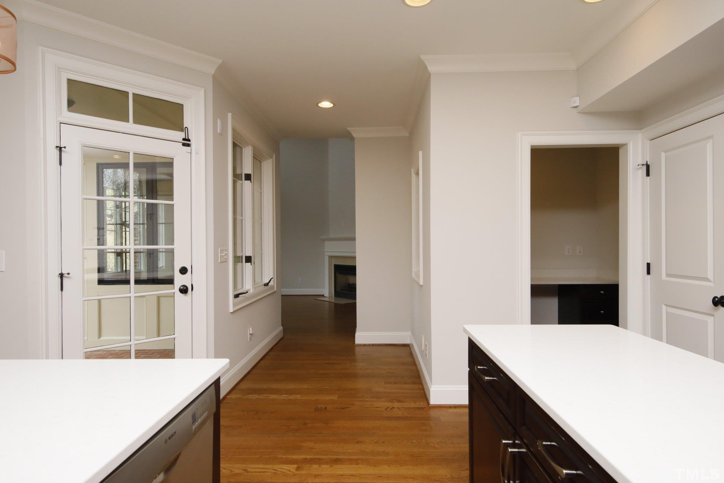 143 Cofield Circle Durham, NC 27707 - Photo 17 of 43 a kitchen with kitchen island a counter top space and wooden floor
