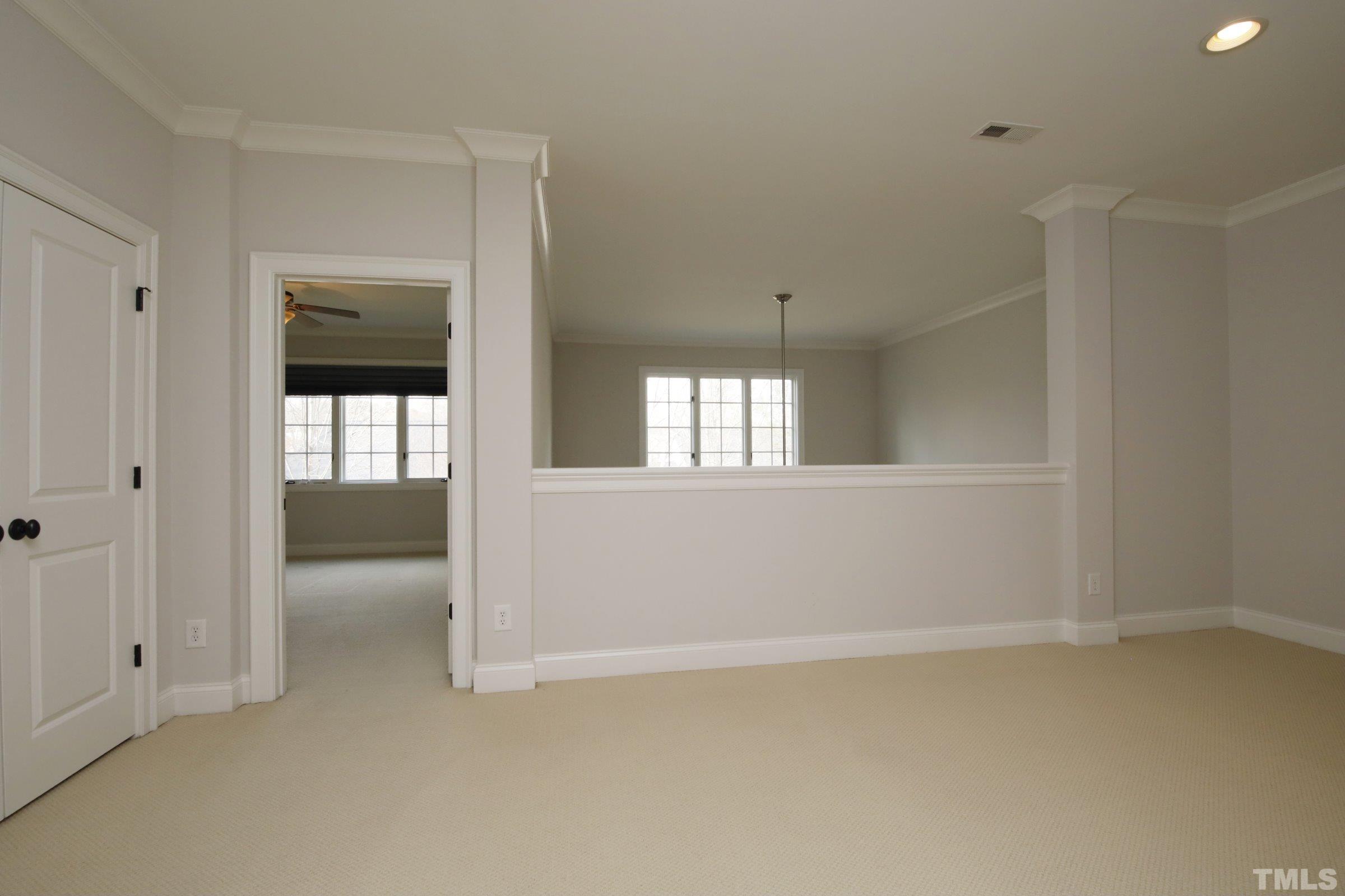 143 Cofield Circle Durham, NC 27707 - Photo 28 of 43 a view of an empty room with wooden floor