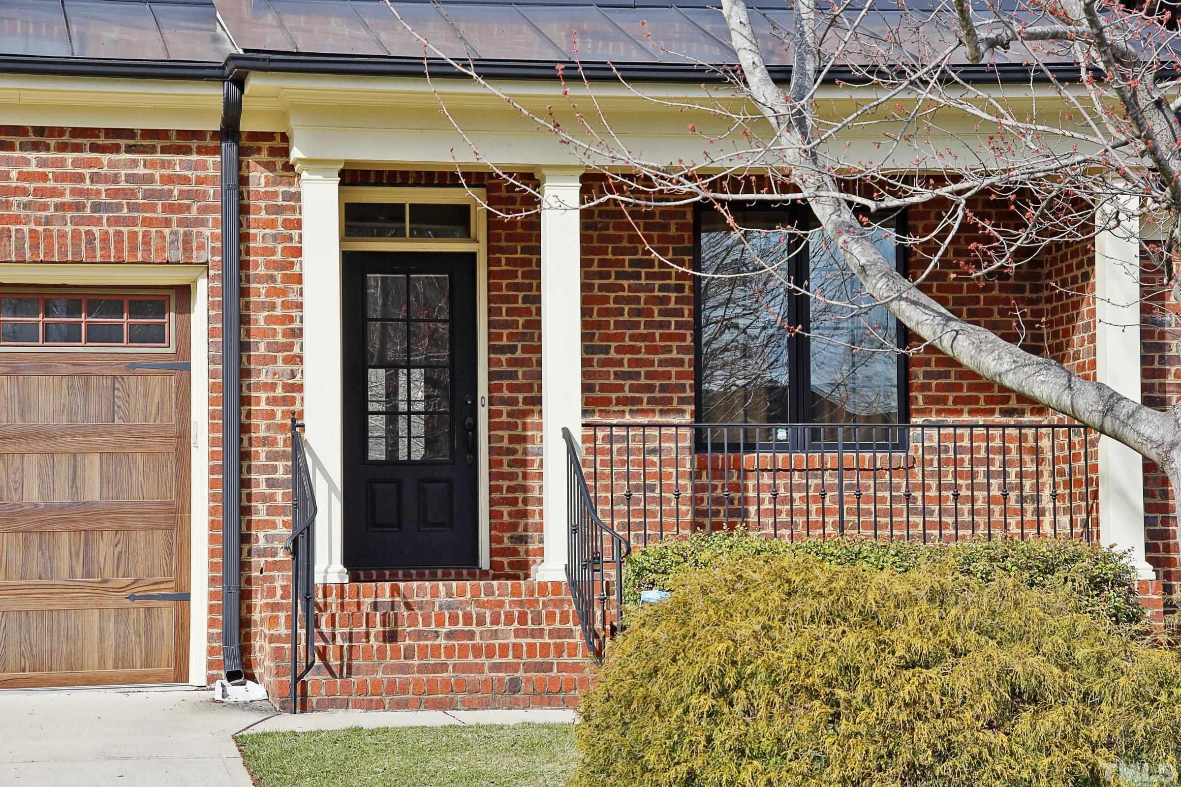 143 Cofield Circle Durham, NC 27707 - Photo 3 of 43 a view of a house with a small yard and wooden floor and fence