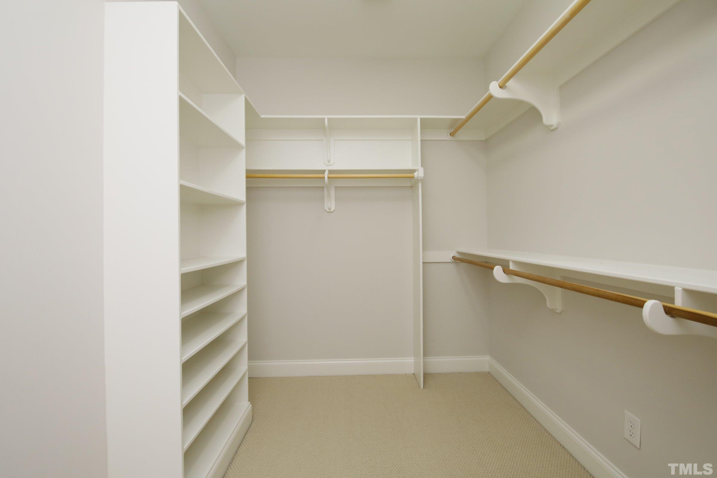 143 Cofield Circle Durham, NC 27707 - Photo 34 of 43 a view of walk in closet with empty racks