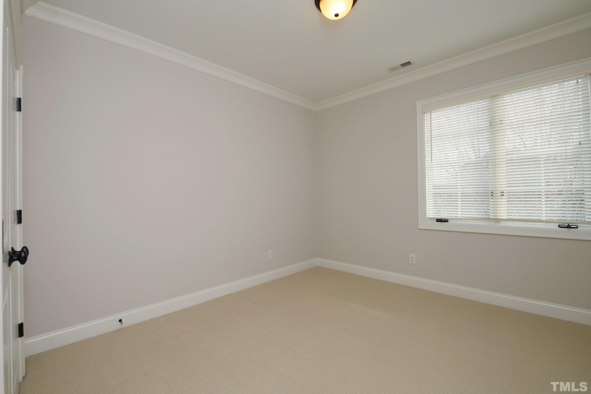 143 Cofield Circle Durham, NC 27707 - Photo 35 of 43 an empty room with a window