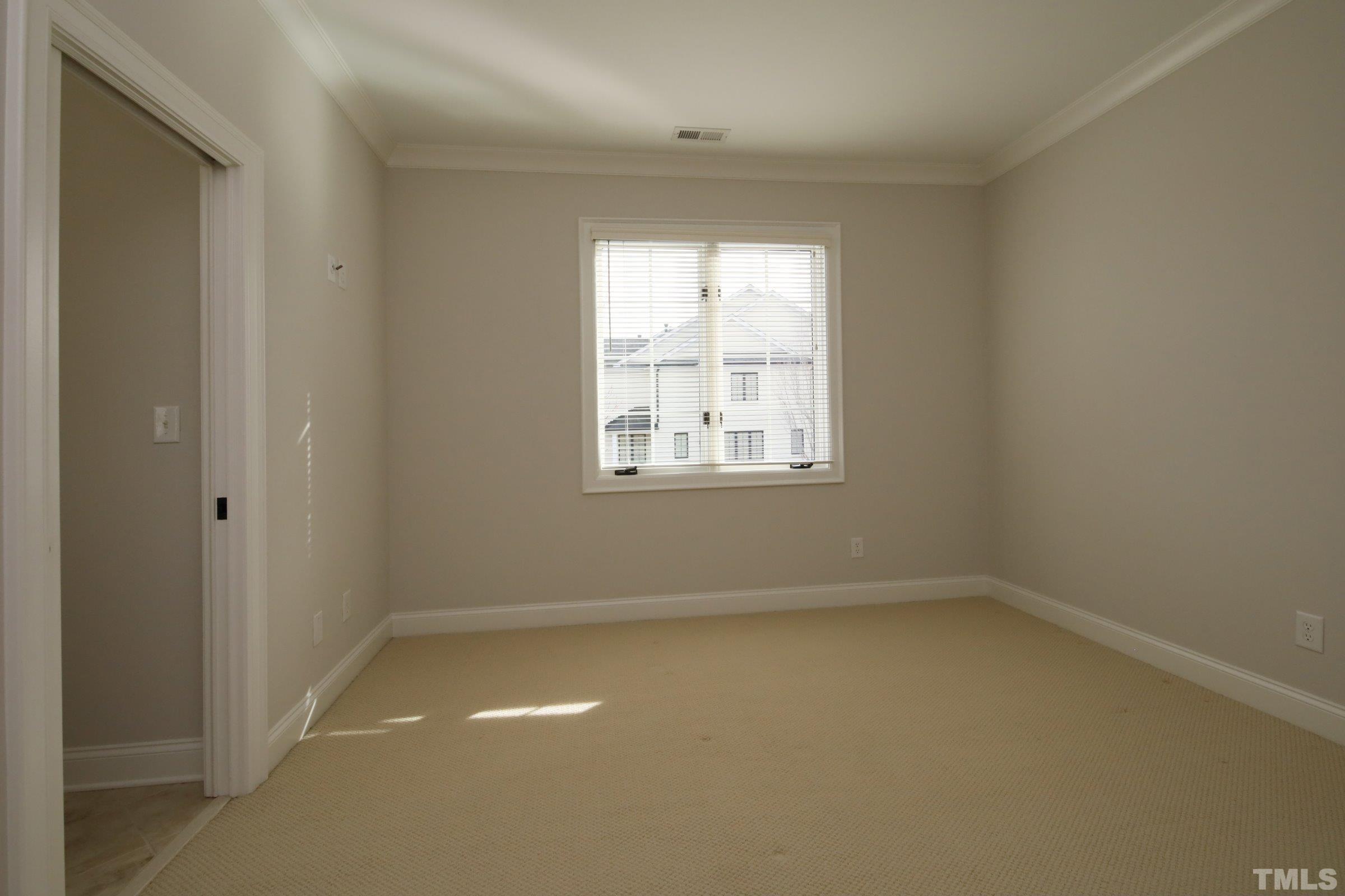 143 Cofield Circle Durham, NC 27707 - Photo 36 of 43 an empty room with a window