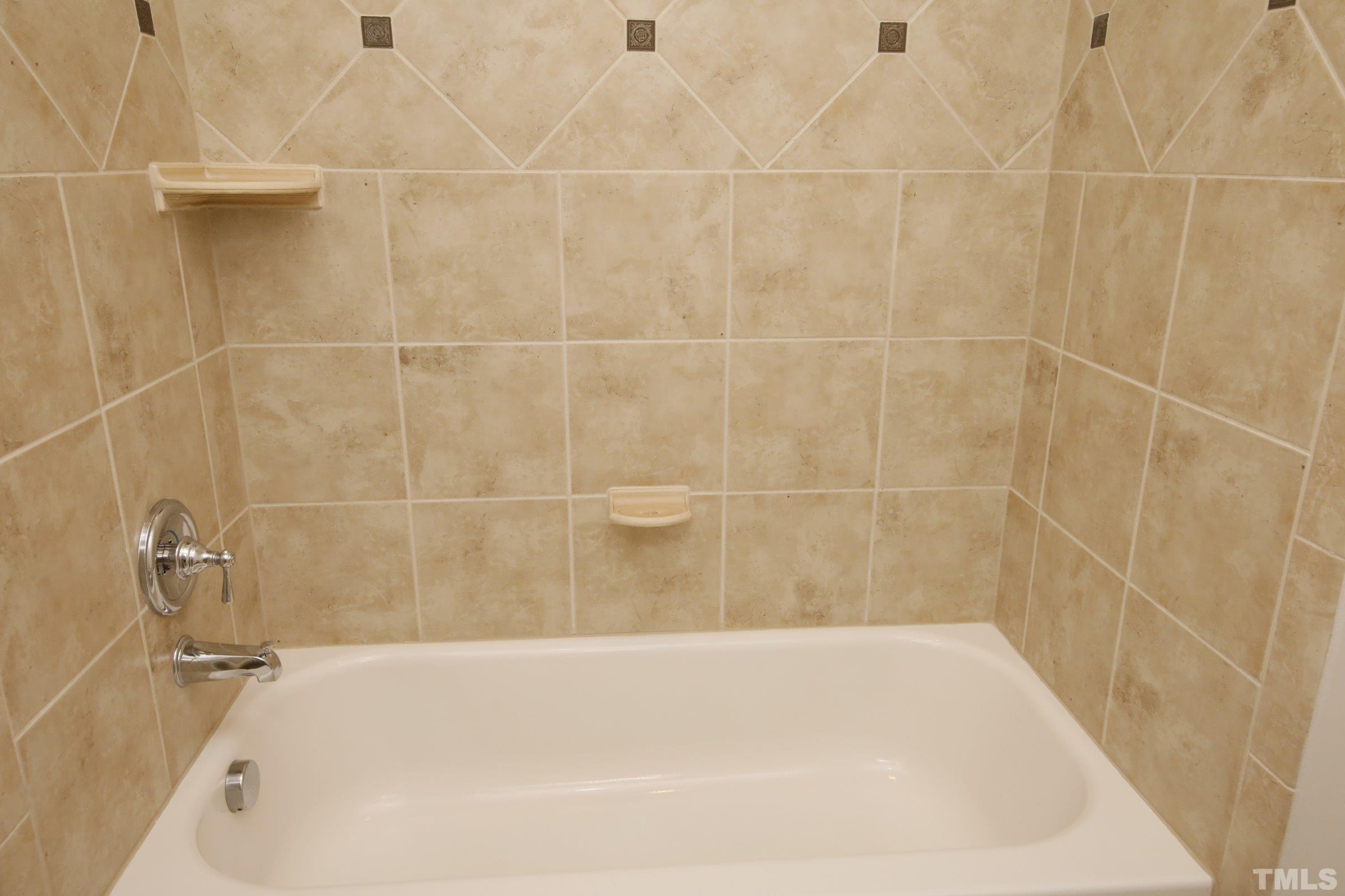 143 Cofield Circle Durham, NC 27707 - Photo 39 of 43 a bathroom with a bathtub