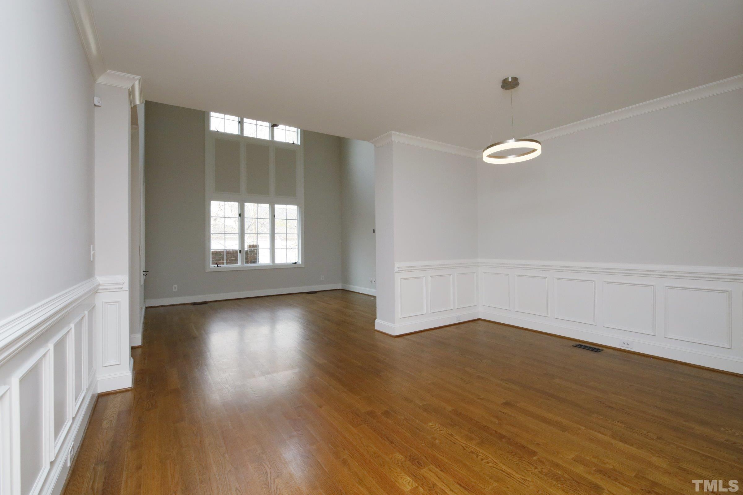 143 Cofield Circle Durham, NC 27707 - Photo 9 of 43 a view of a livingroom with wooden floor and window