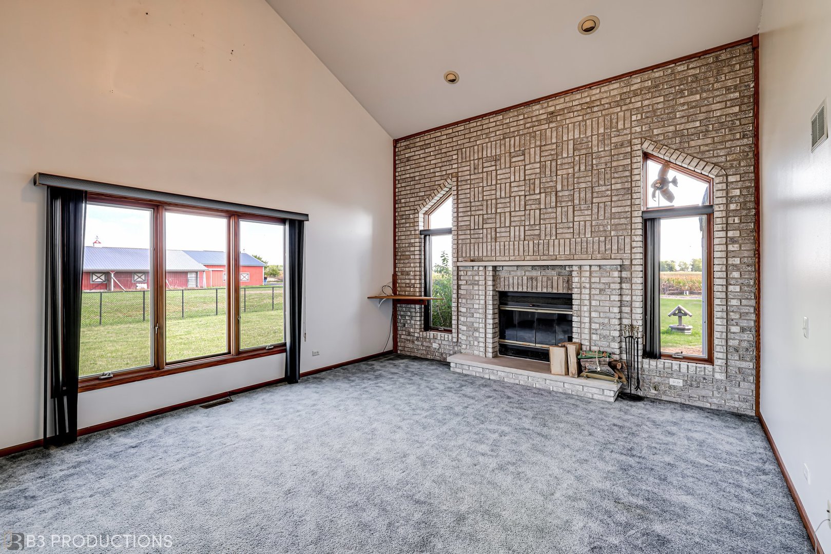 10814 West Bruns Road Monee, IL 60449 - Photo 26 of 39 an empty room with floor to ceiling window and an outdoor view