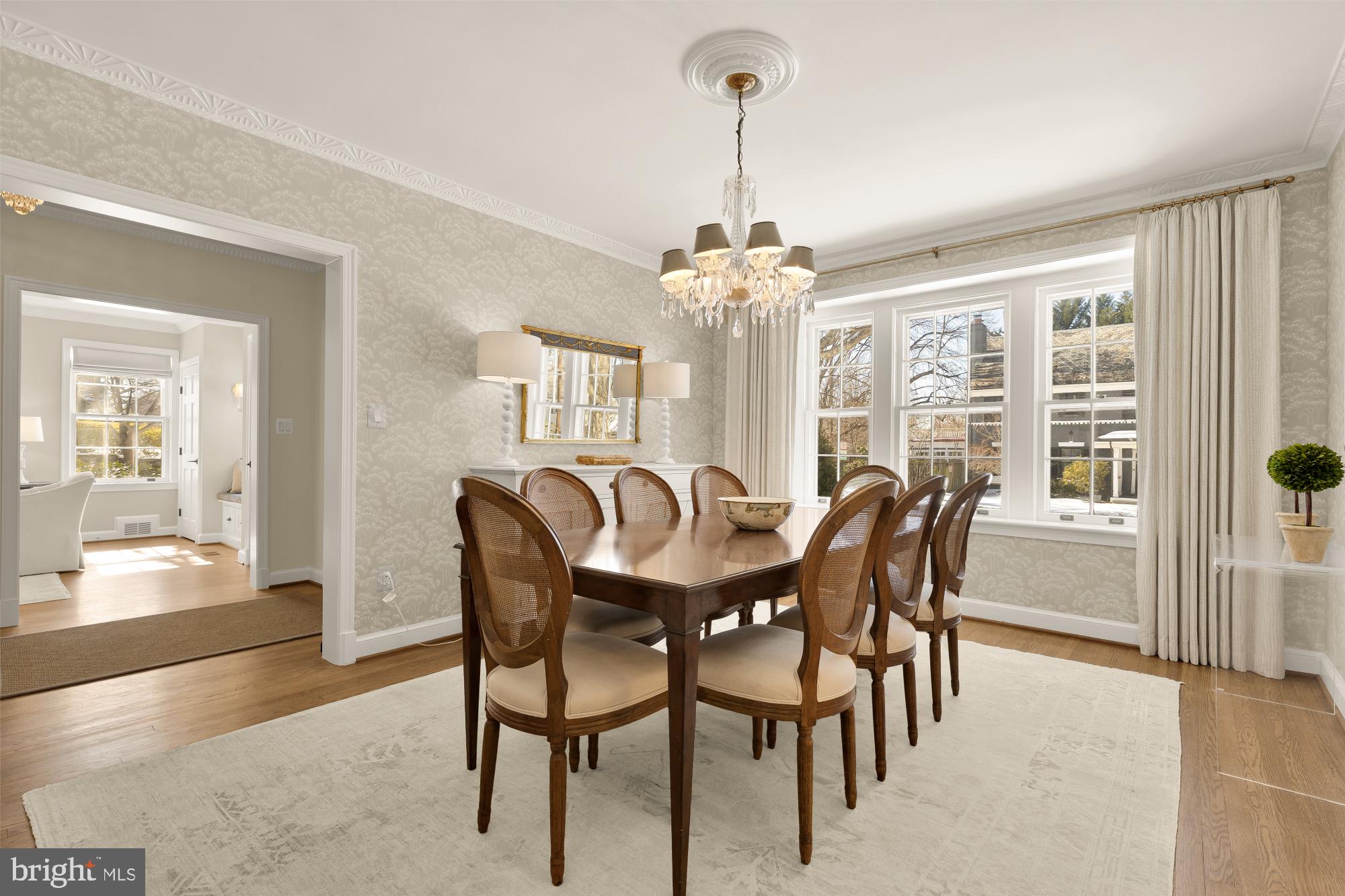 4501 47th Street Northwest Washington, DC 20016 - Photo 16 of 61 a view of a dining room with furniture wooden floor and chandelier