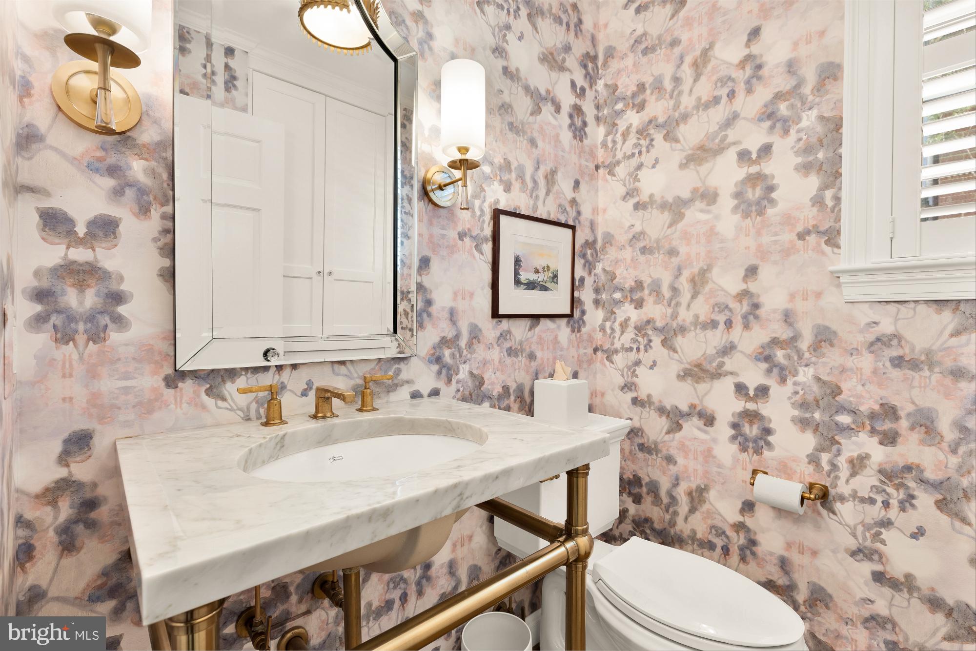 4501 47th Street Northwest Washington, DC 20016 - Photo 18 of 61 a bathroom with a sink toilet and mirror