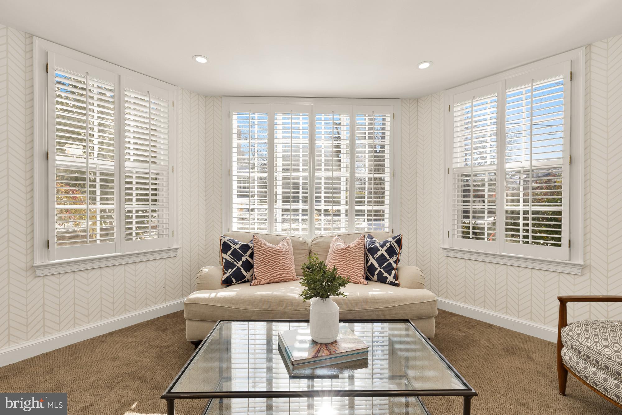 4501 47th Street Northwest Washington, DC 20016 - Photo 21 of 61 a living room with furniture and floor to ceiling windows