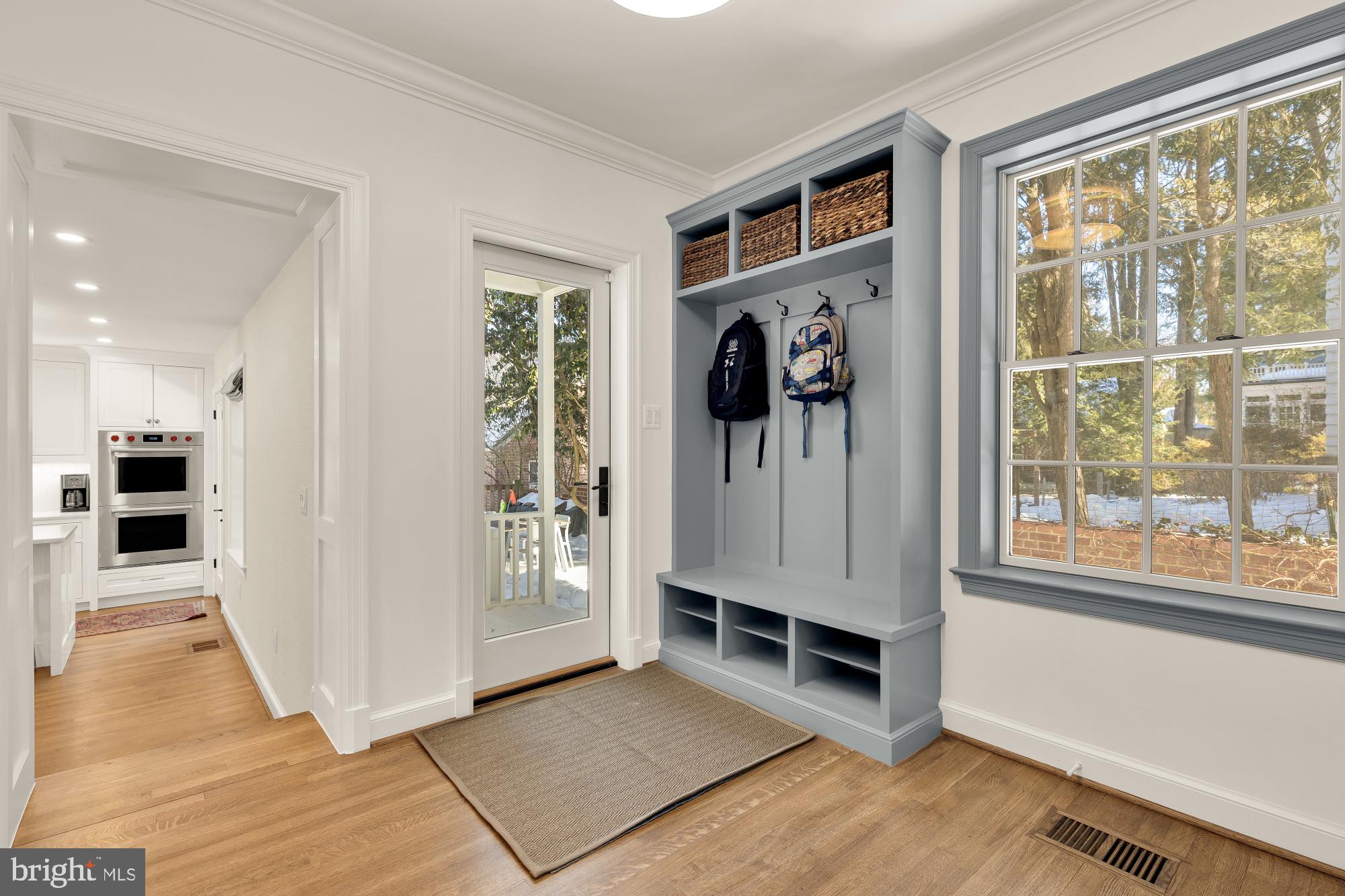 4501 47th Street Northwest Washington, DC 20016 - Photo 22 of 61 a view of a livingroom with furniture window and a kitchen