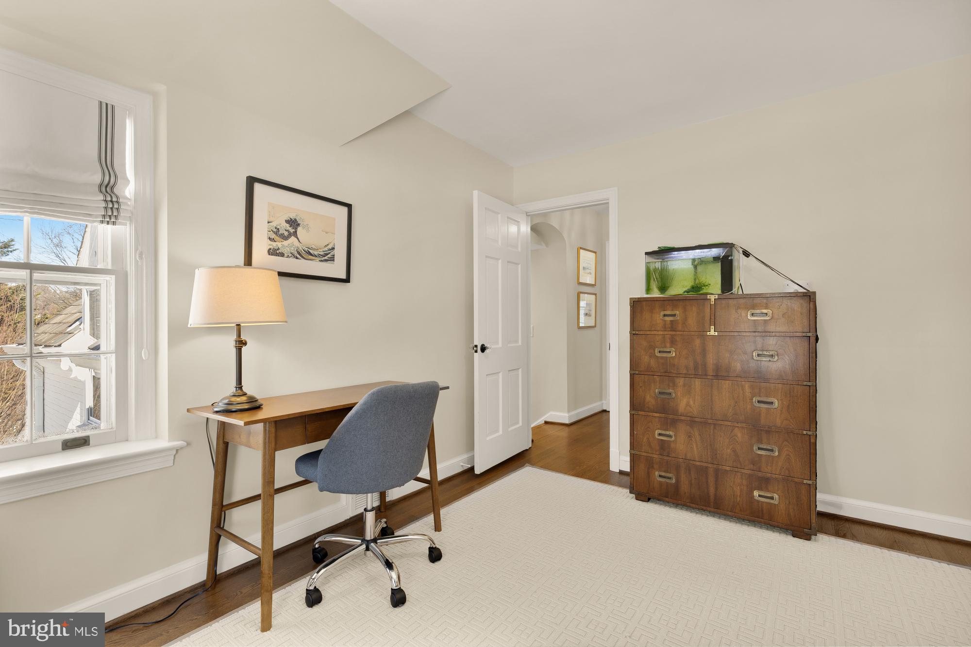 4501 47th Street Northwest Washington, DC 20016 - Photo 39 of 61 a bedroom with a bed and a window
