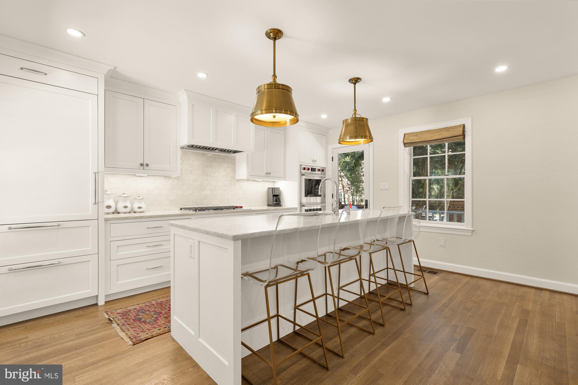 4501 47th Street Northwest Washington, DC 20016 - Photo 4 of 61 a kitchen with wooden floor and window