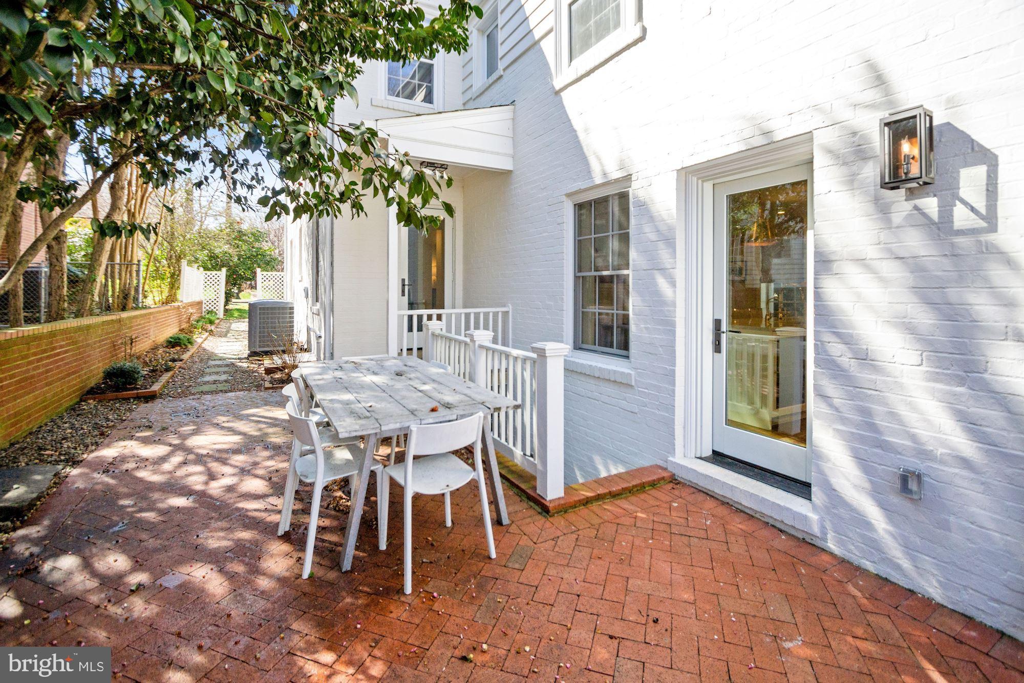4501 47th Street Northwest Washington, DC 20016 - Photo 54 of 61 a outdoor space with a table and chairs