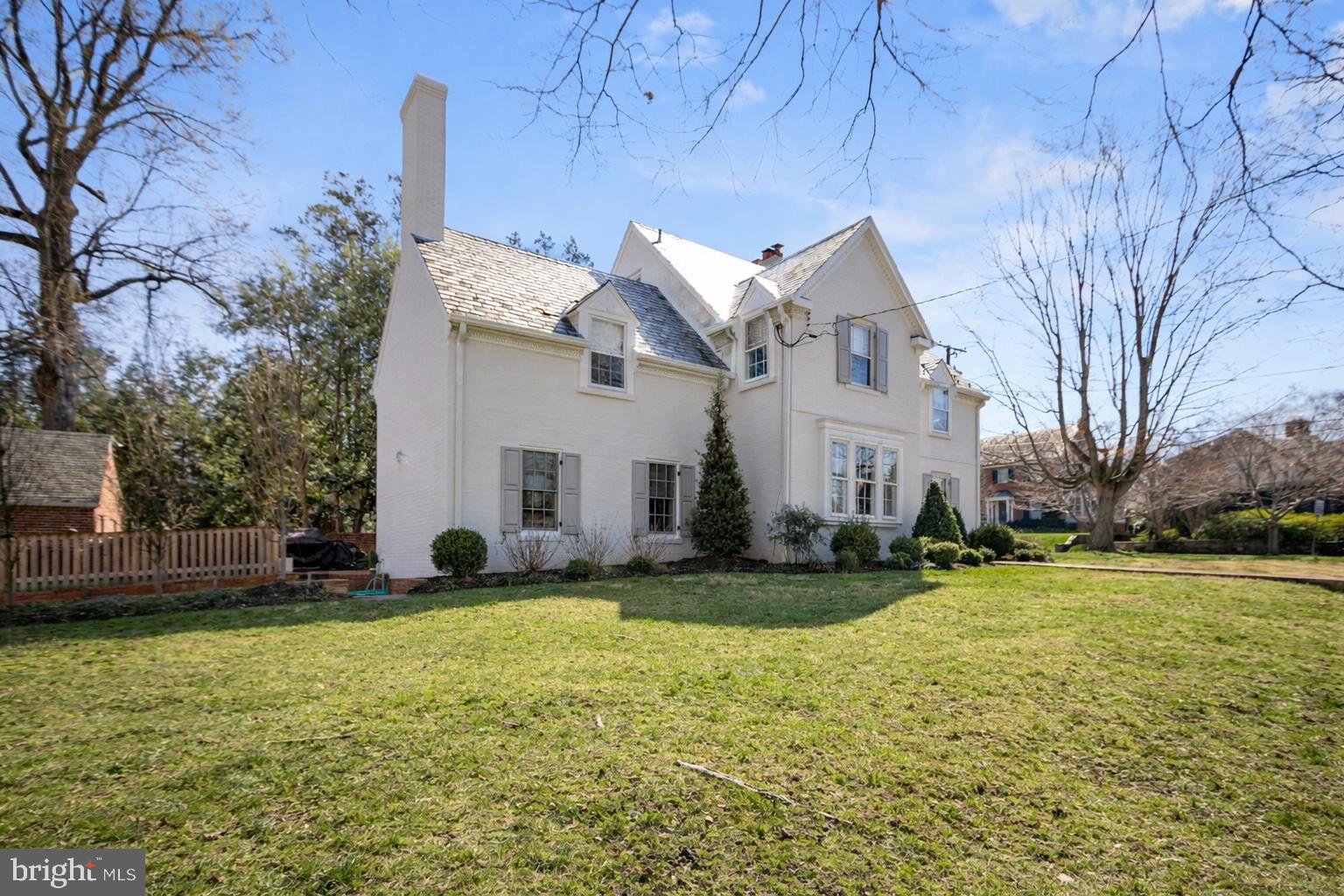 4501 47th Street Northwest Washington, DC 20016 - Photo 59 of 61 a view of a house with a yard and garage