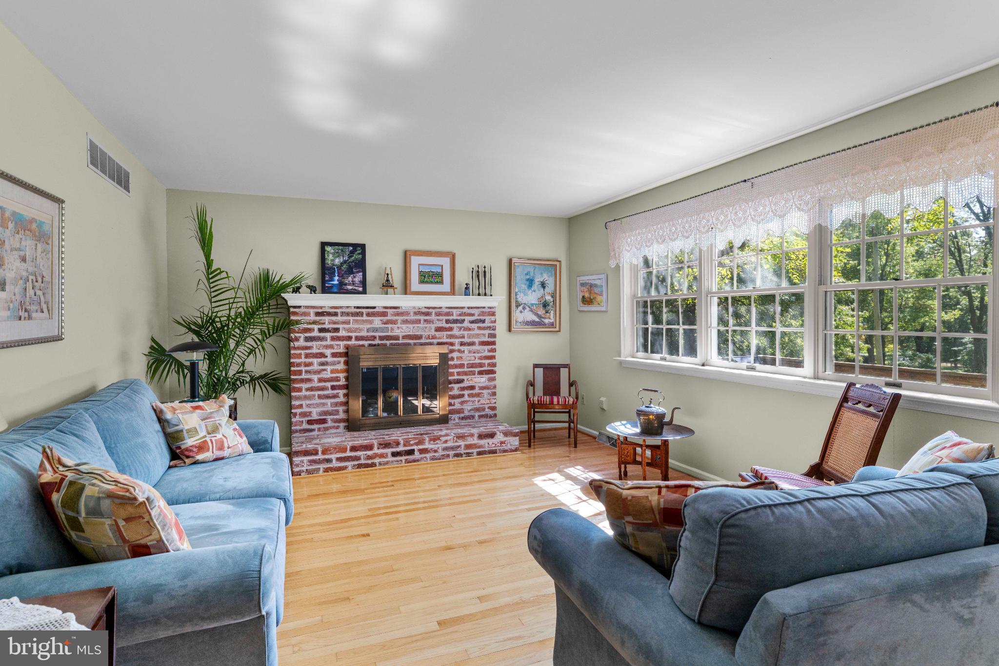 1478 Dillon Road Ambler, PA 19002 - Photo 14 of 42 a living room with furniture and a fireplace