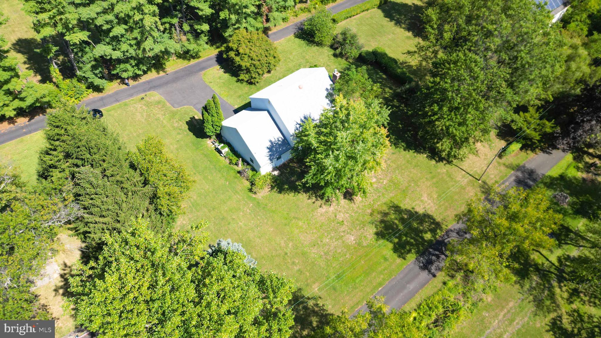 1478 Dillon Road Ambler, PA 19002 - Photo 3 of 42 an aerial view of residential house with swimming pool and lawn chairs
