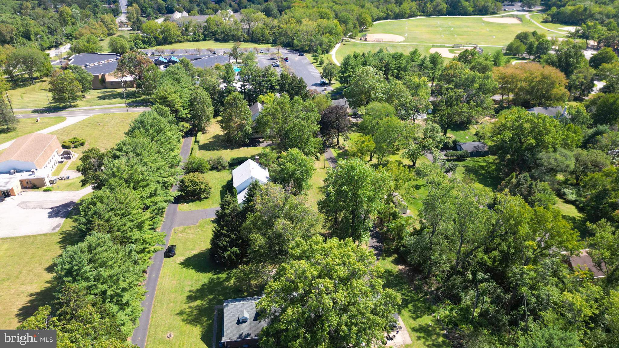 1478 Dillon Road Ambler, PA 19002 - Photo 4 of 42 an aerial view of residential houses with outdoor space and trees all around