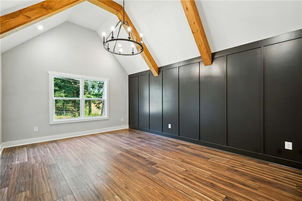 125 Old Alabama Road Southeast Emerson, GA 30137 - Photo 21 of 37 a view of an empty room with wooden floor and windows