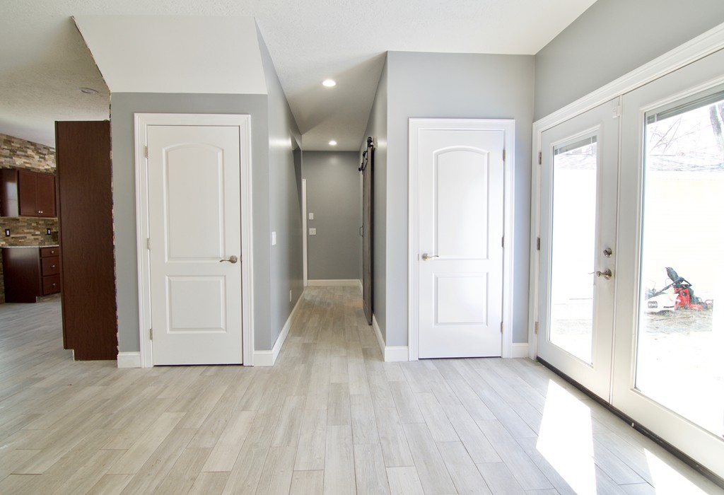 170 Mayflower Road Springfield, MA 01118 - Photo 17 of 30 a view of a hallway with wooden floor and closet area