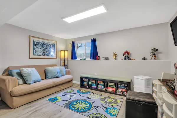 a living room with furniture and a couch