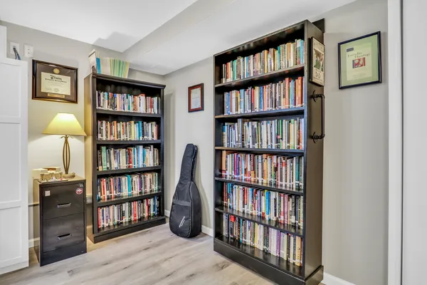a view of a book room with lots of books