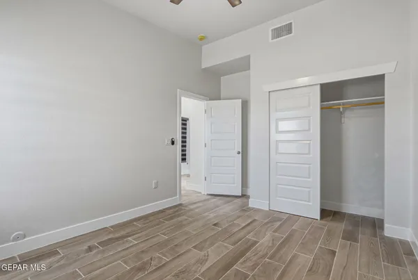 a bathroom with a bathtub and a toilet