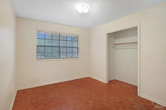 a view of empty room with windows