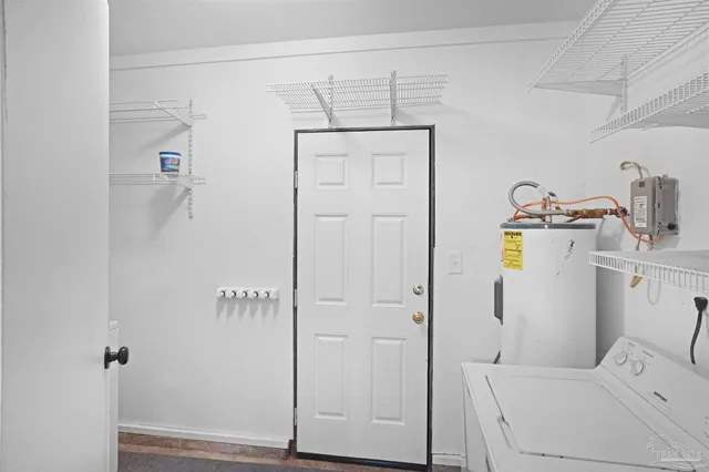 a bathroom with a shower and toilet