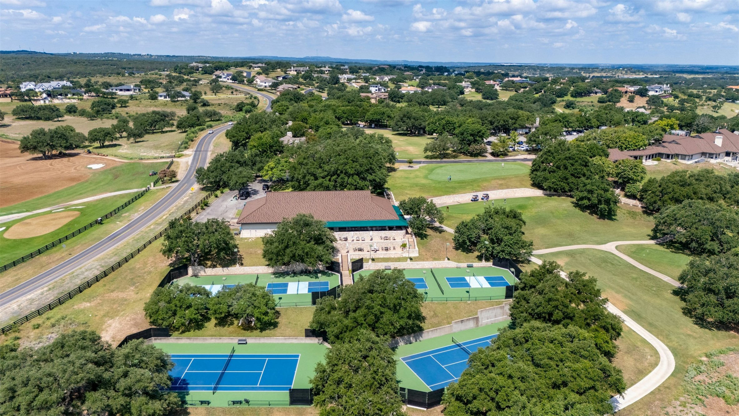 26710 Founders Place Spicewood, TX 78669 - Photo 16 of 19 an aerial view of multiple house