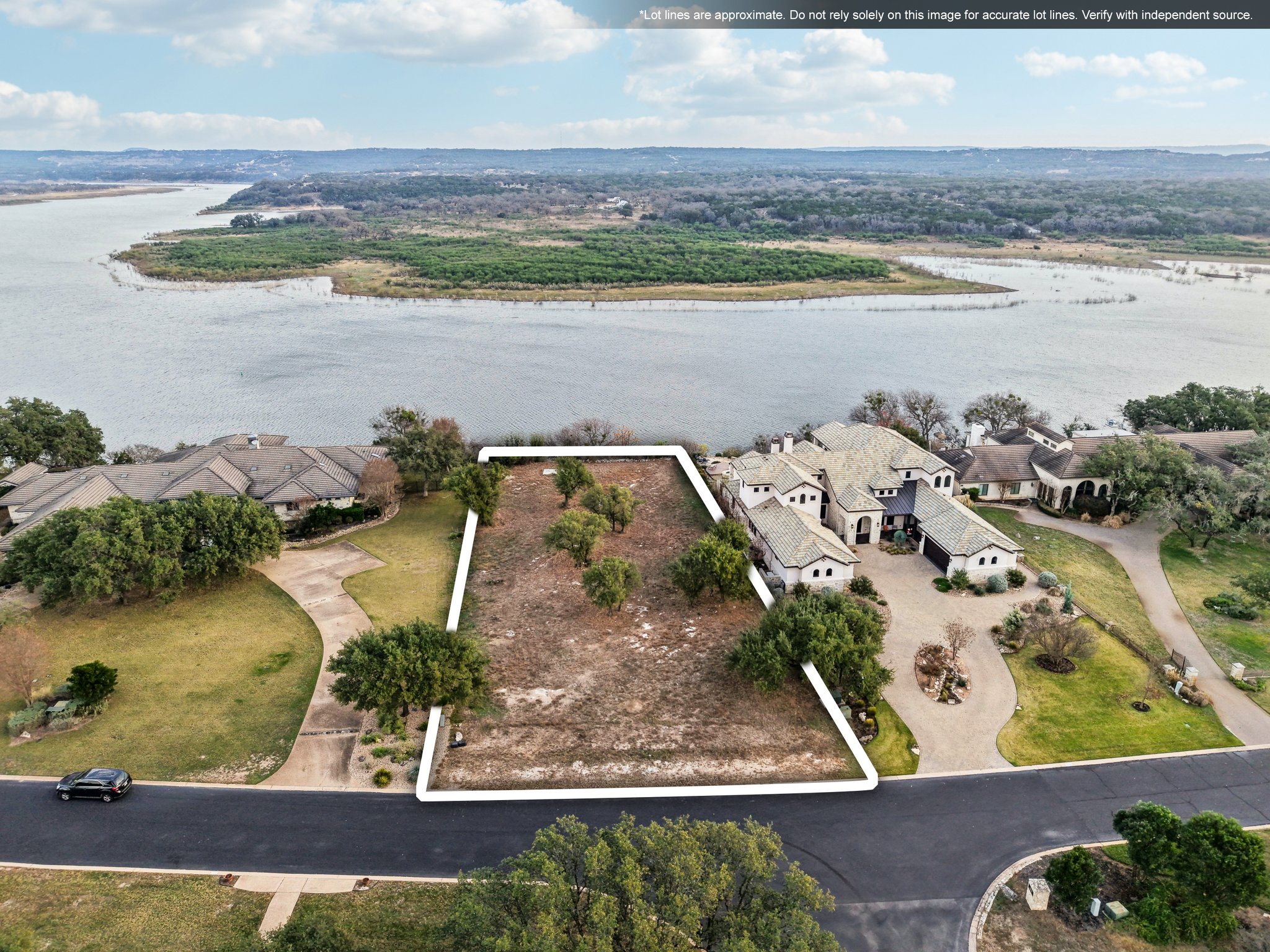 26710 Founders Place Spicewood, TX 78669 - Photo 2 of 19 an aerial view of a residential houses with outdoor space