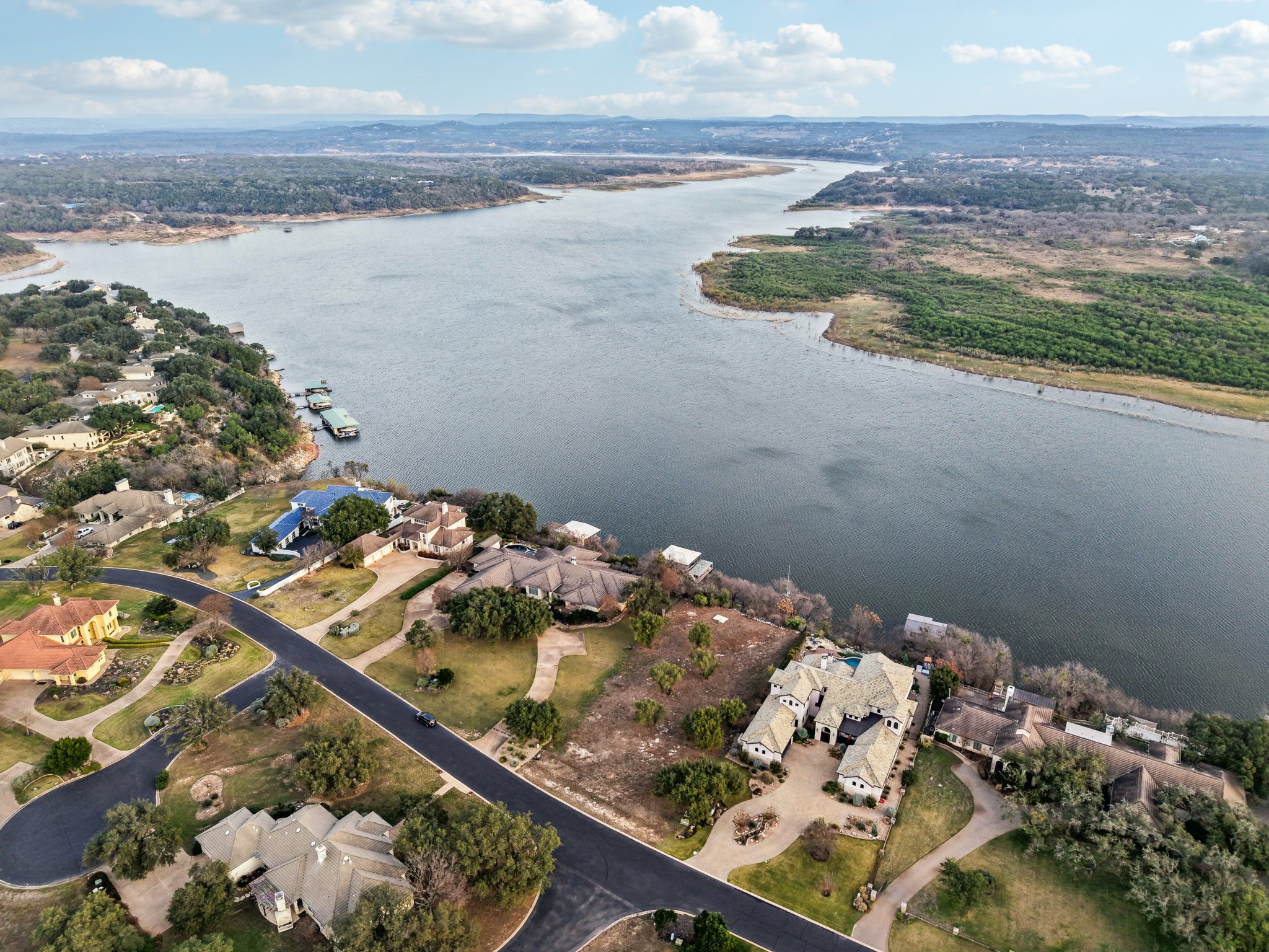 26710 Founders Place Spicewood, TX 78669 - Photo 3 of 19 a view of a lake from a balcony