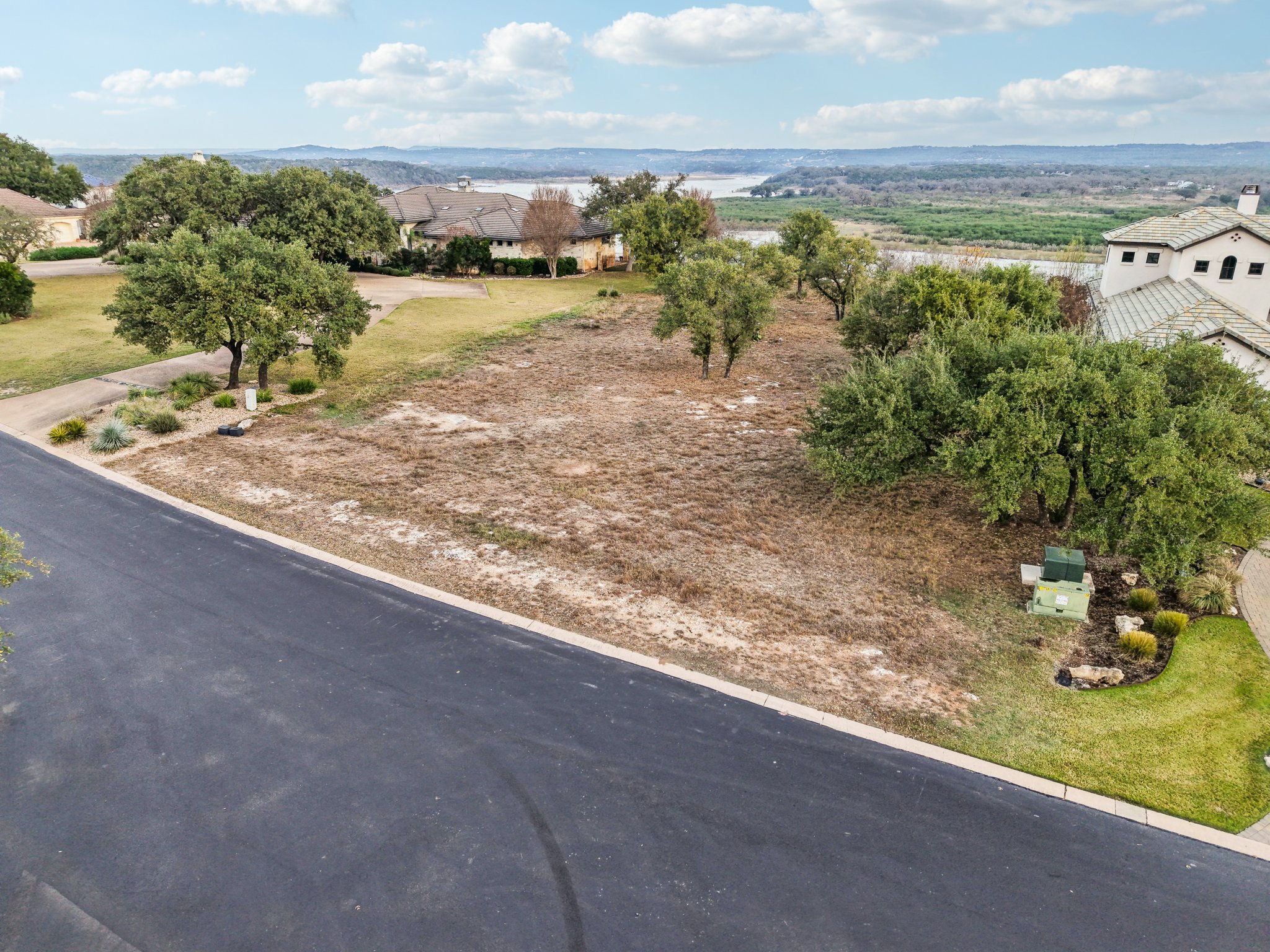 26710 Founders Place Spicewood, TX 78669 - Photo 4 of 19 a view of a yard with an outdoor space