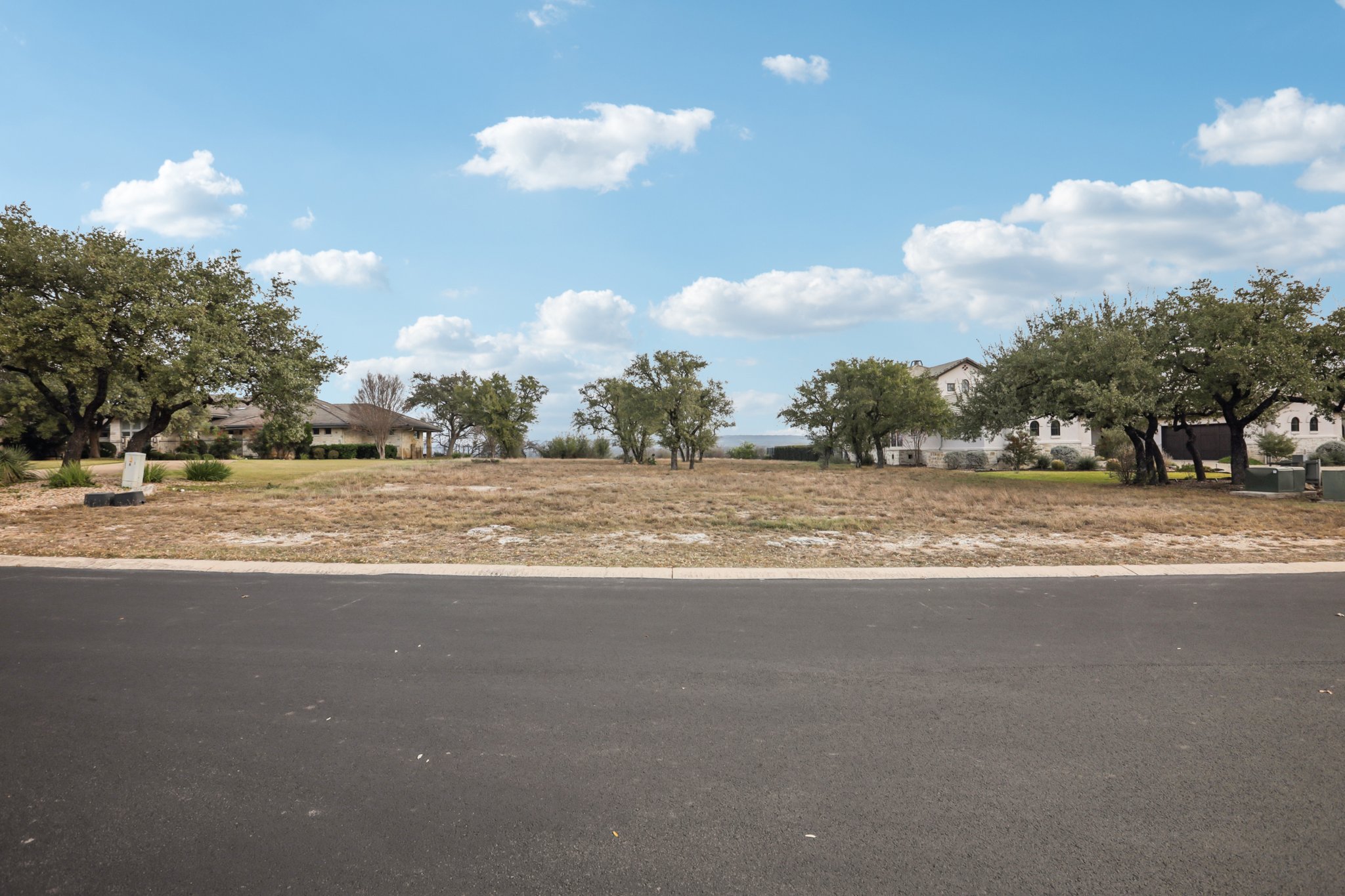 26710 Founders Place Spicewood, TX 78669 - Photo 5 of 19 a view of ocean and with car parked