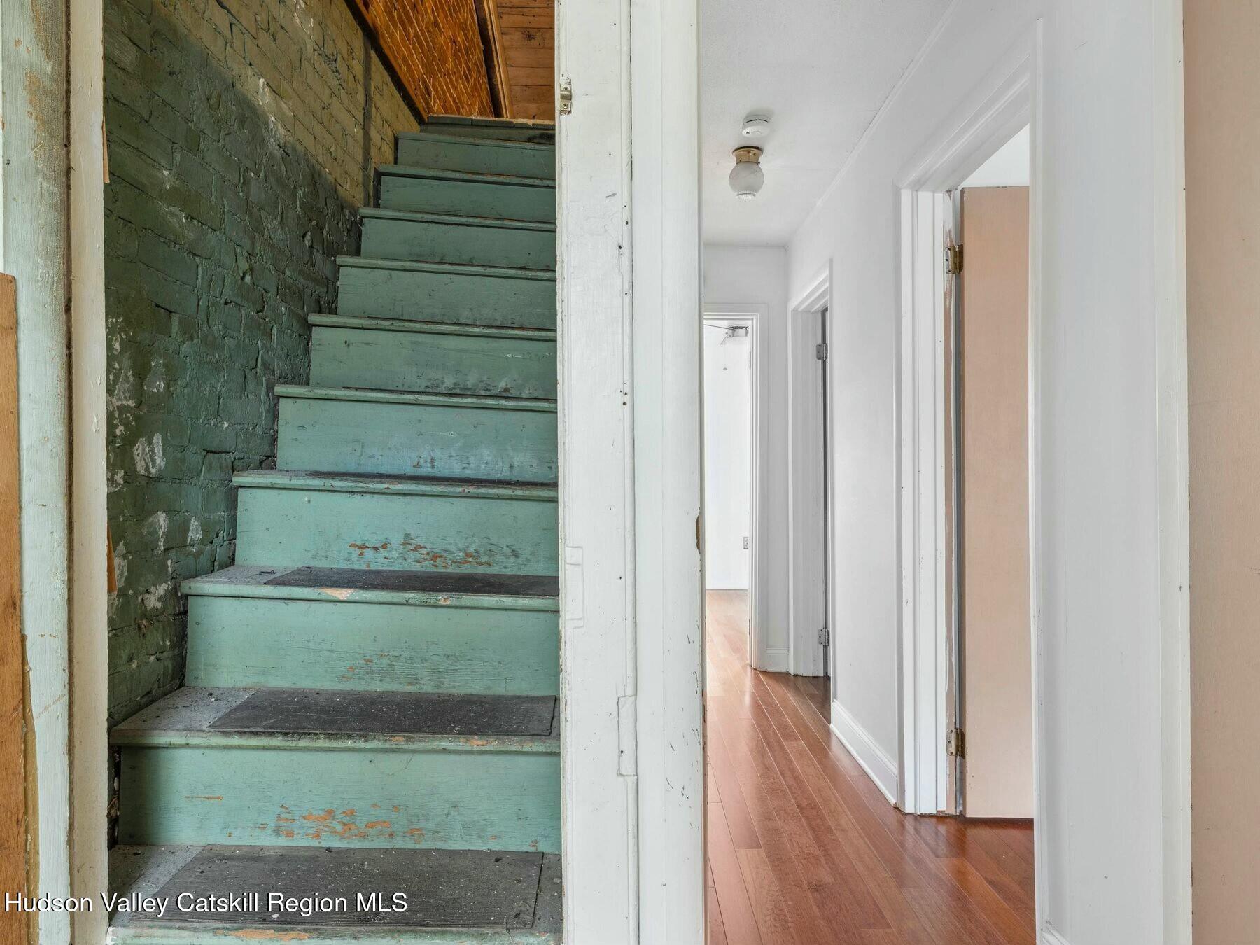 27 Brick Row Street Athens, NY 12015 - Photo 19 of 37 a view of entryway and hall with wooden floor