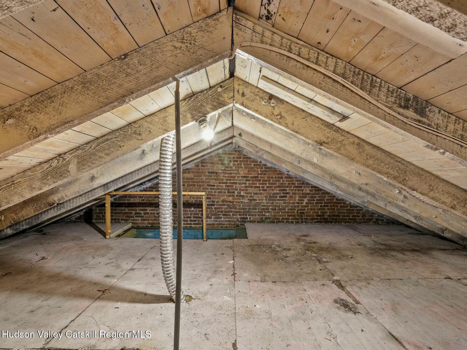 27 Brick Row Street Athens, NY 12015 - Photo 20 of 37 a view of a backyard with parking space