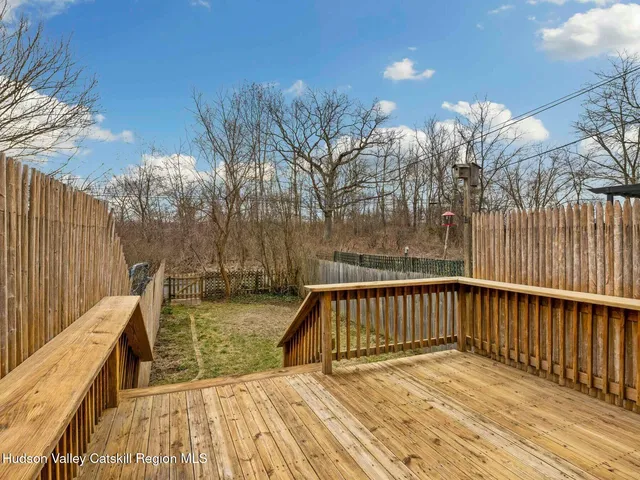 a view of outdoor space with deck and wooden floor
