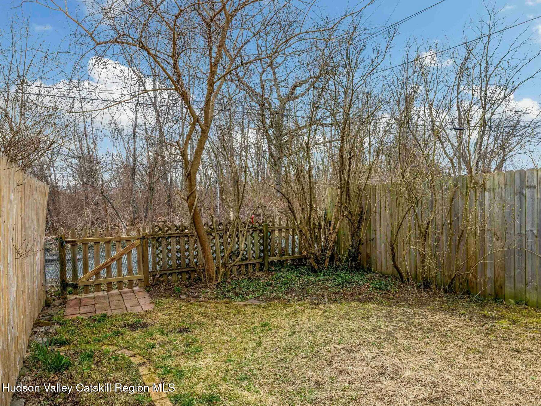 27 Brick Row Street Athens, NY 12015 - Photo 29 of 37 a view of backyard with large trees