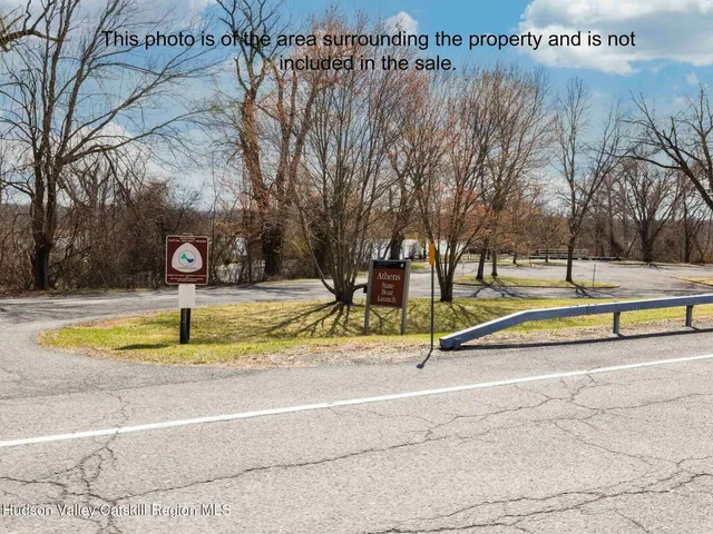 a view of a swimming pool with yard